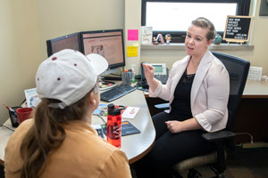 Gateway student talking with her advisor