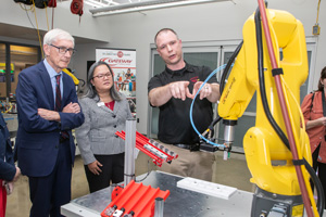 Governor Evers meets Gateway Technical College President and CEO Veronique Tran and Executive Vice President-Academic Affairs Matt Janisin at Gateway's SC Johnson iMET Center