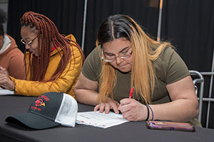 Students signing letters of intent