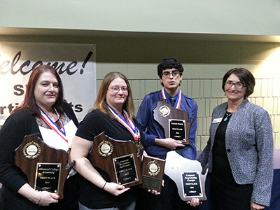 Lorissa Cheatham, Michelle Sauceda, Benjamin Leon and club adviser and Accounting instructor Pam Hillman