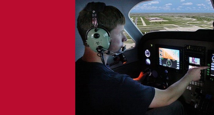Aeronautics student learning in a flight simulator