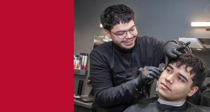 Barber Technology student giving a haircut