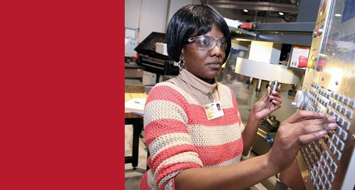 Gateway CNC Programmer student learning hands-on.
