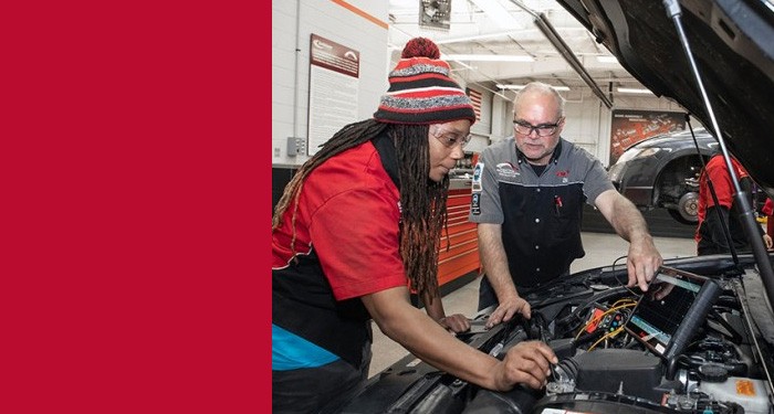 Instructor explaining the use of a scan tool to a Gateway Automotive Technology student.