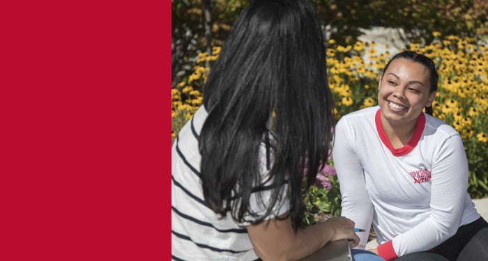Two Gateway Technical College students talking outside on one of our campuses