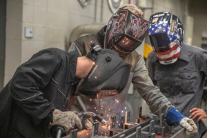 Gateway welding students work on a project that will honor fallen Vietnam War veterans