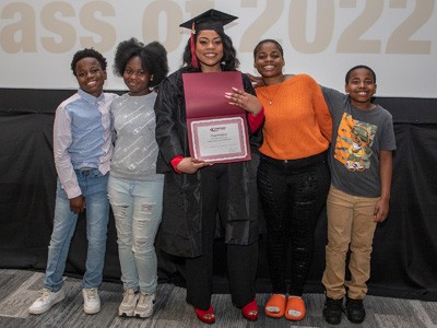 Graduate with her kids