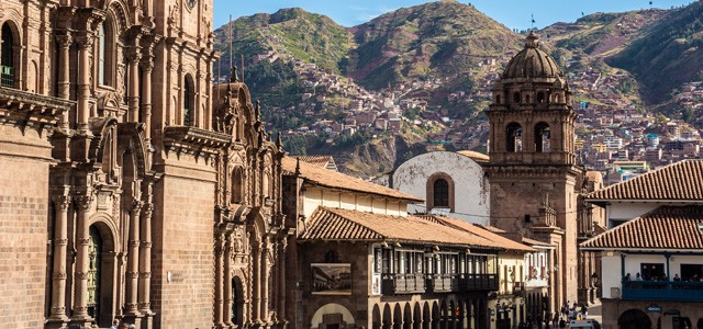 Plaza de armas in sunset with local people. It is a centre point of Cusco city, Cusco, Peru.