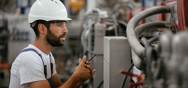 Apprentice working on a machine