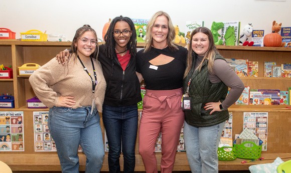 Foundation of Teacher Education students standing and smiling as a group