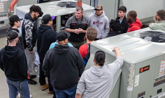 Gateway instructor with student in a HVAC lab
