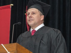 Jeremy Butler, student responder, speaks at podium at Gateway's 2026 Commencement Ceremony