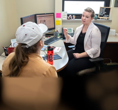 Gateway student speaking with her advisor