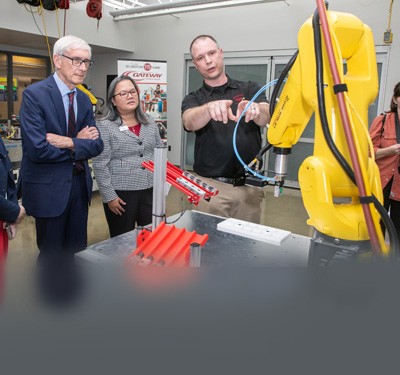 Governor Evers meets Gateway Technical College President and CEO Veronique Tran and Executive Vice President-Academic Affairs Matt Janisin at Gateway's SC Johnson iMET Center